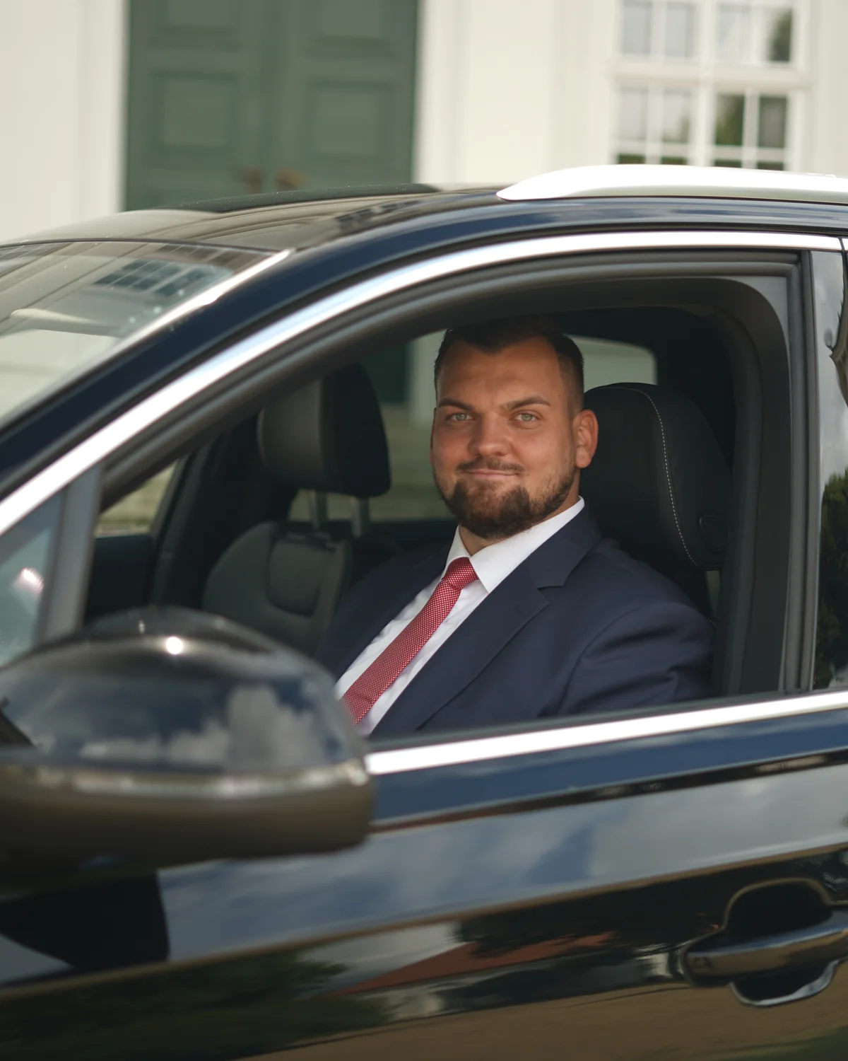 Marco Wieland, owner of Wachschutz Berlin, behind the wheel